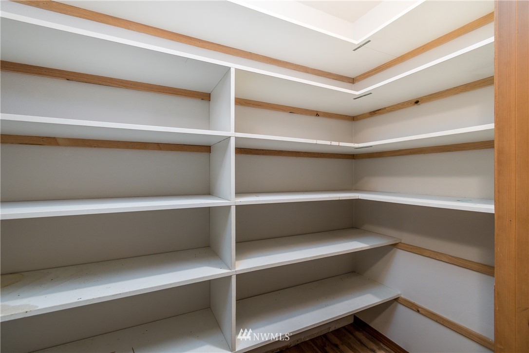 1320 Coal Creek Road Longview, WA 98632 - Photo 24 of 34 a view of walk in closet with empty racks