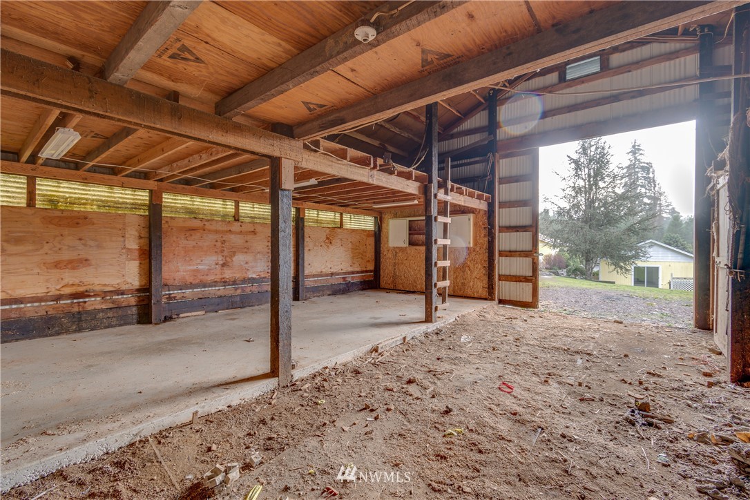 1320 Coal Creek Road Longview, WA 98632 - Photo 30 of 34 a view of a room with wooden floor
