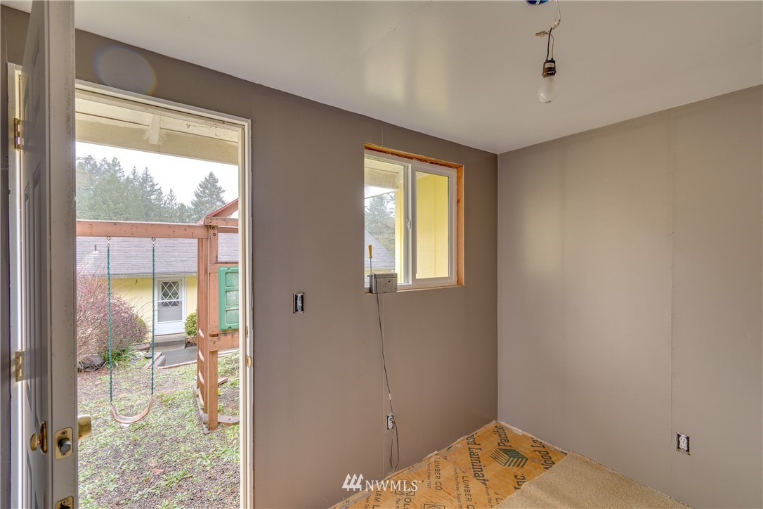 1320 Coal Creek Road Longview, WA 98632 - Photo 32 of 34 a bedroom with a bed and the view of bedroom