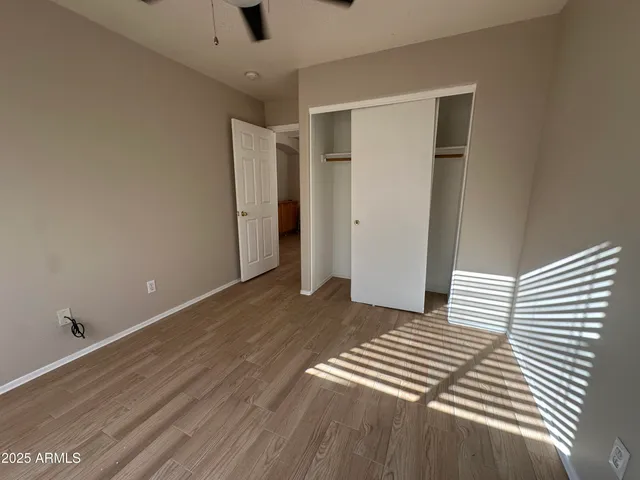 a view of a livingroom with wooden floor
