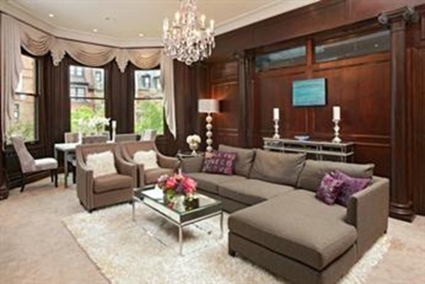 365 Beacon Street, Unit 2 Boston, MA 02116 - Photo 1 of 15 a living room with furniture and a chandelier
