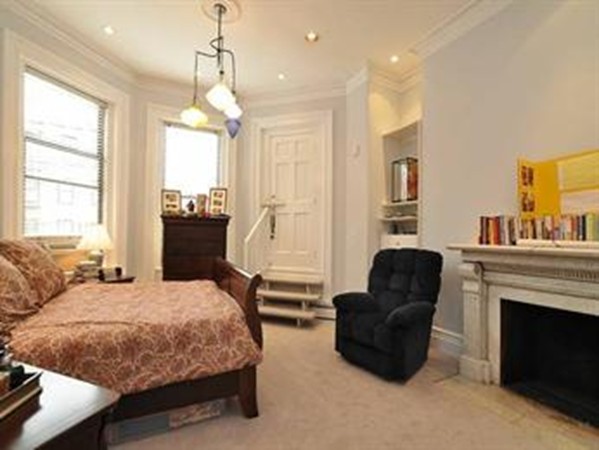 365 Beacon Street, Unit 2 Boston, MA 02116 - Photo 5 of 15 a bedroom with a bed a couch and dresser