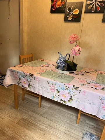 a bedroom with a bed and dresser