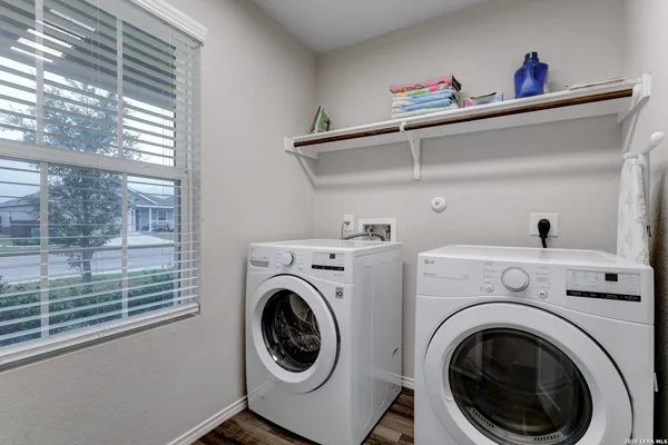 a utility room with dryer and washer