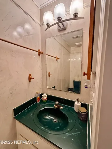 a bathroom with a toilet and a sink
