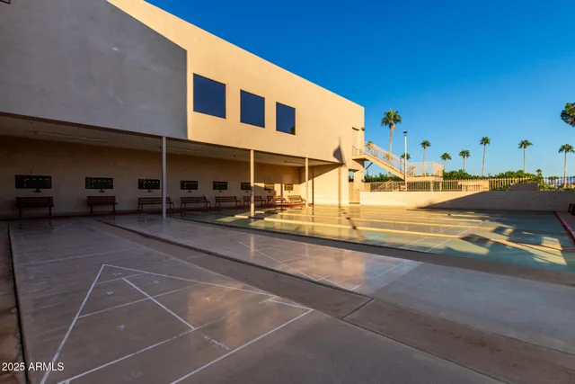a view of a park with plants and trees