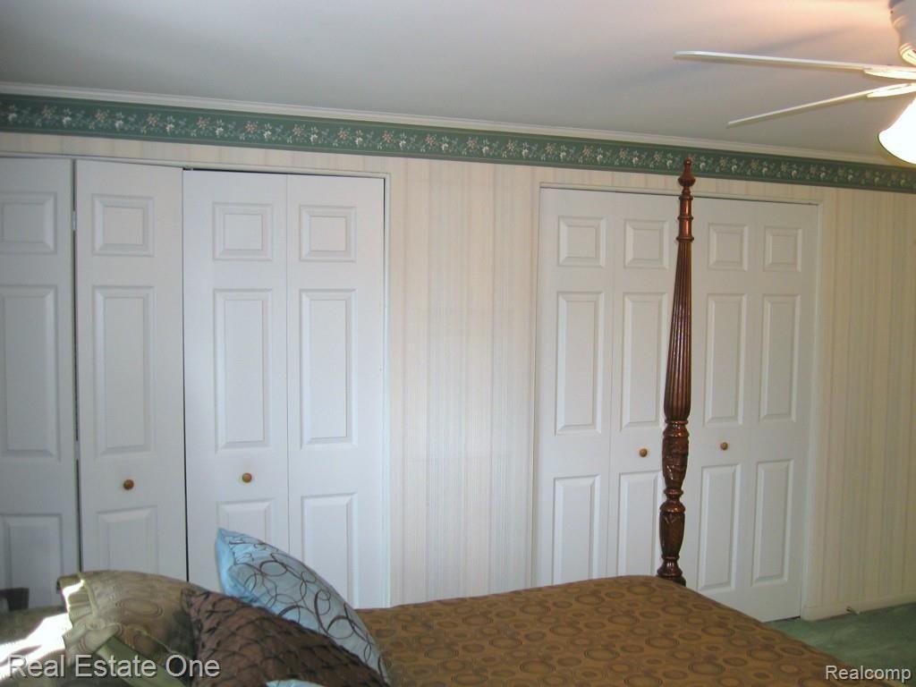 32417 Hearthstone Road Farmington, MI 48334 - Photo 18 of 37 FULL WALL OF CLOSETS IN MASTER BR