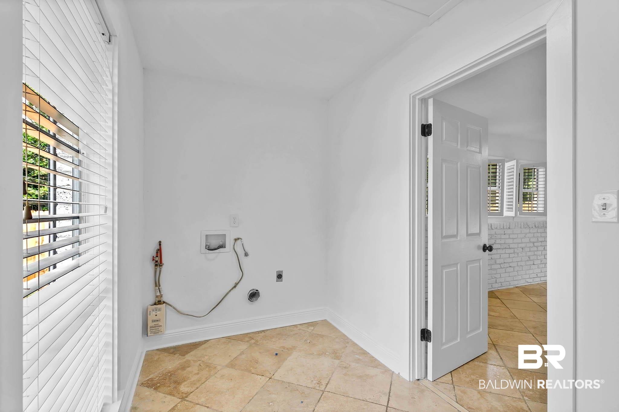 4705 Sherry Court Mobile, AL 36693 - Photo 30 of 100 Laundry room featuring hookup for a washing machine, electric dryer hookup, and light tile patterned floors
