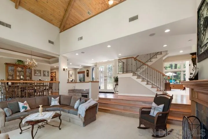 16163 Del Norte Poway, CA 92064 - Photo 4 of 22 a living room with furniture and kitchen view