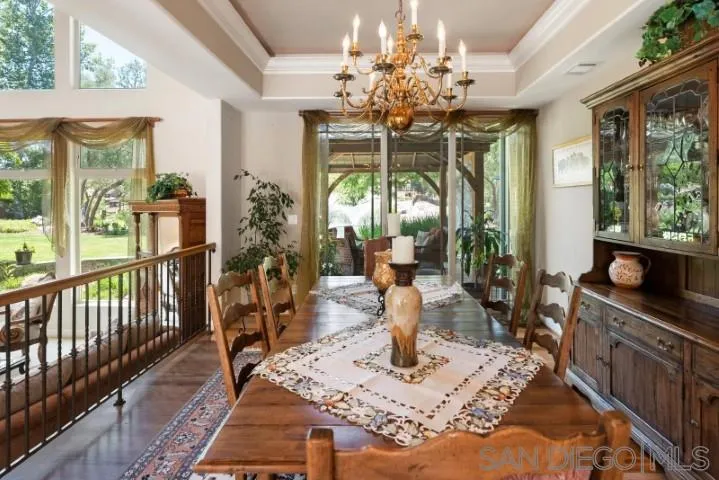 16163 Del Norte Poway, CA 92064 - Photo 5 of 22 a very nice looking dining room with a large dining table and a chandelier