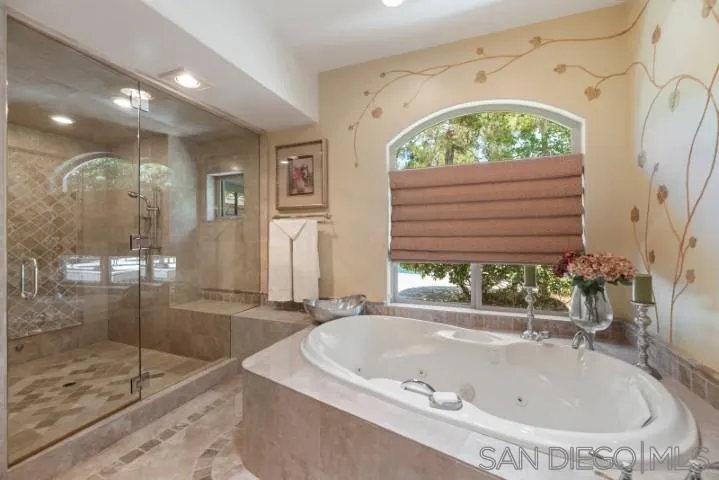 16163 Del Norte Poway, CA 92064 - Photo 7 of 22 a bathroom with a tub and shower