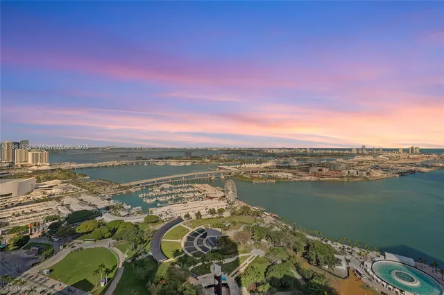 a view of a city with an ocean