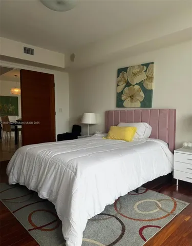 a view of a lake with a city