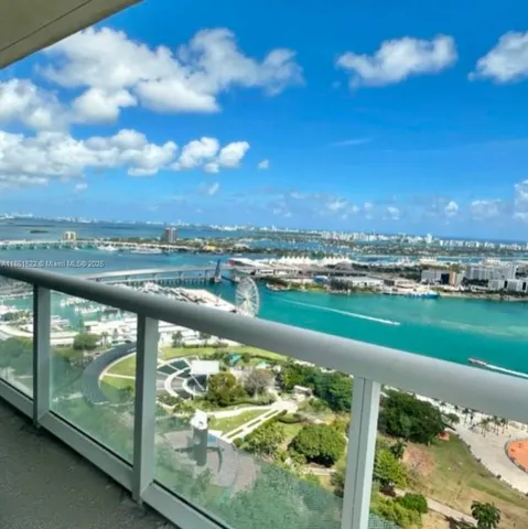 a view of a city with tall buildings