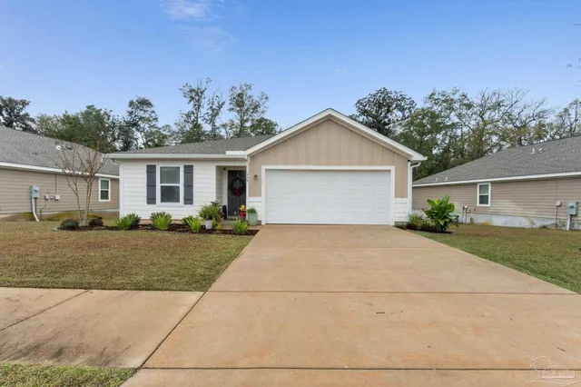 front view of a house and a yard