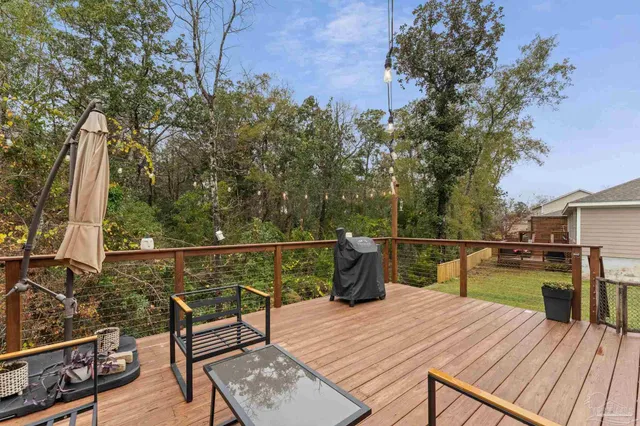 swimming pool view with a seating space
