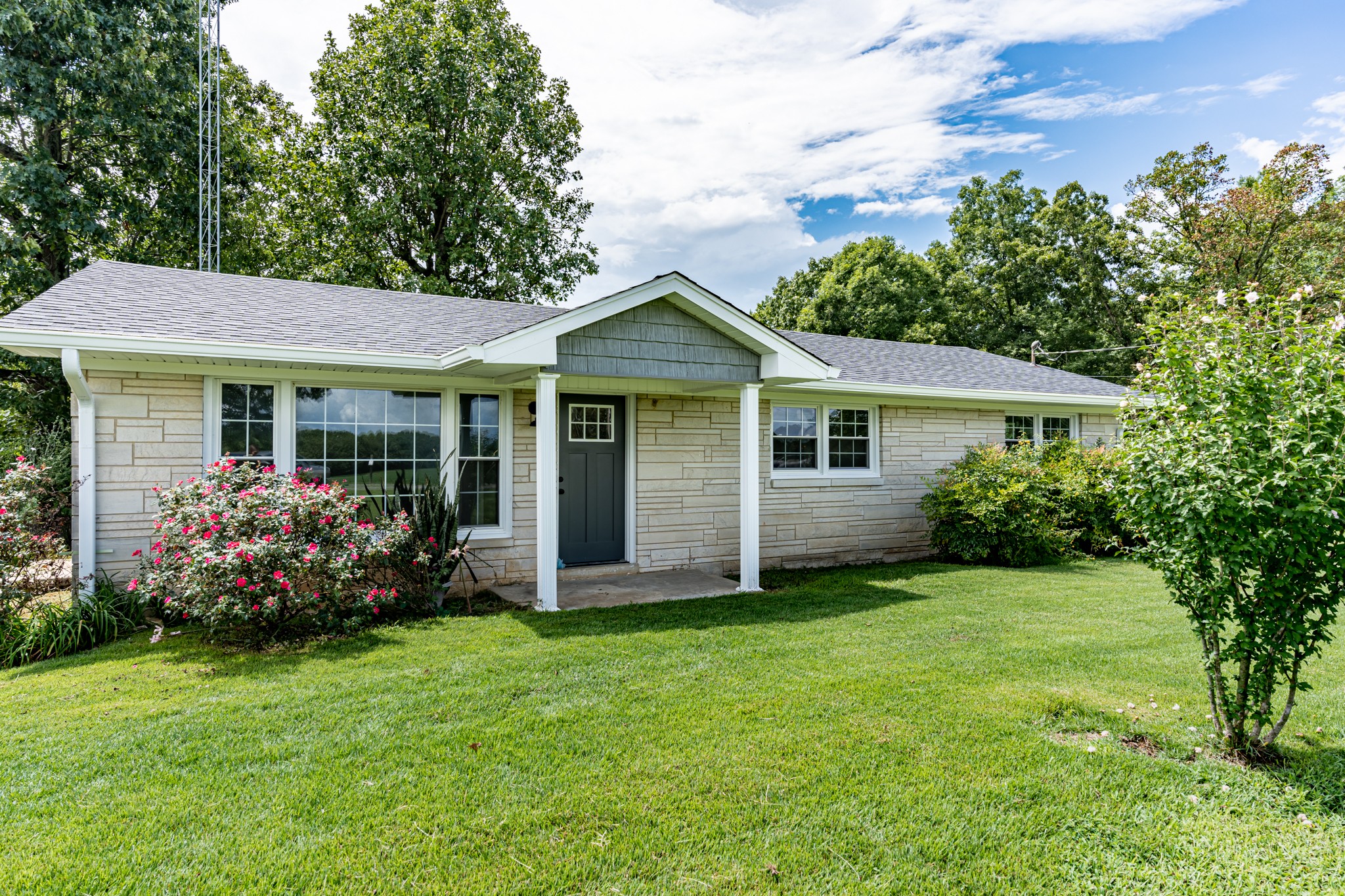 239 Durham Road Leoma, TN 38468 - Photo 1 of 10 a front view of a house with garden