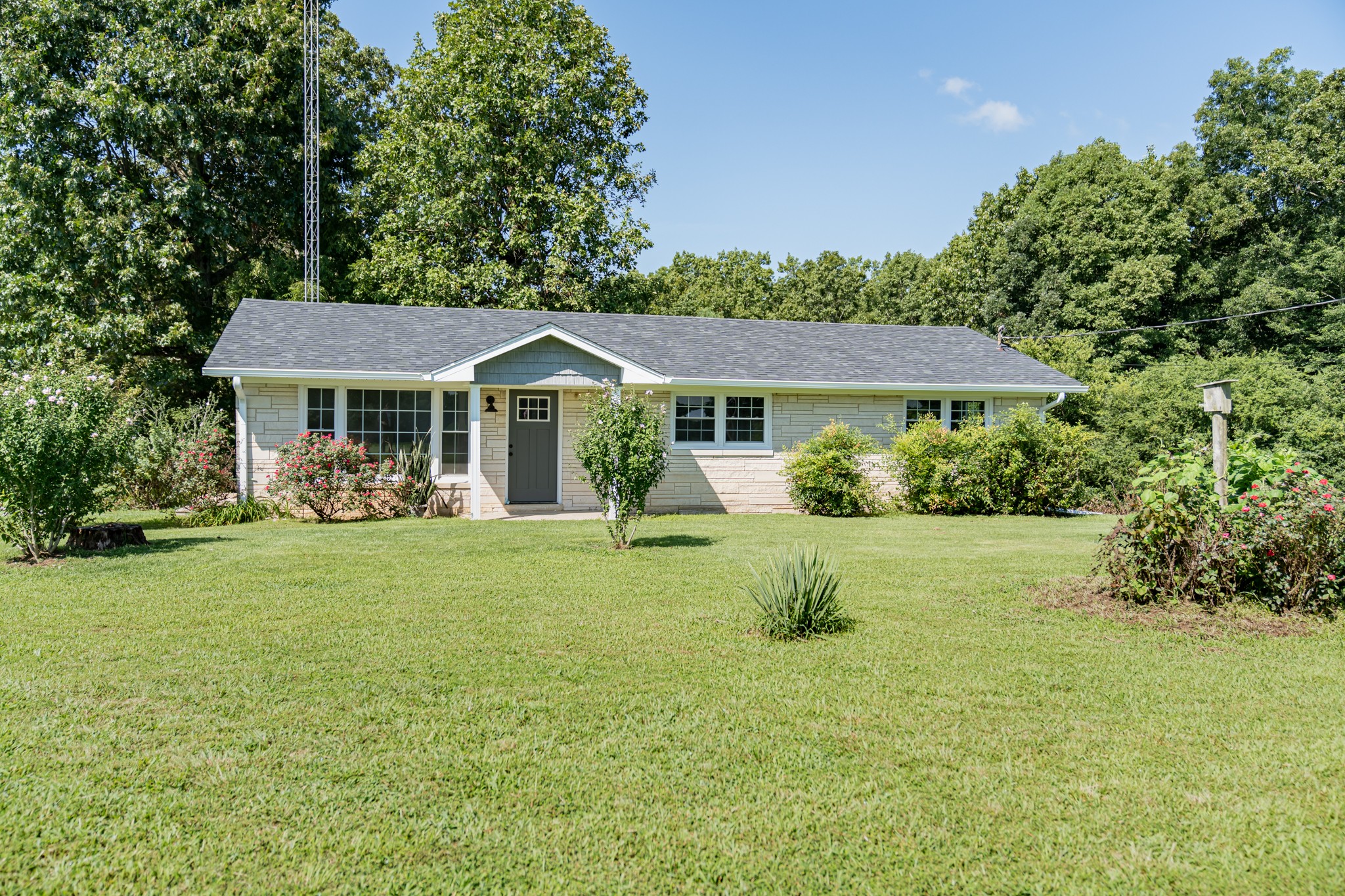 239 Durham Road Leoma, TN 38468 - Photo 2 of 10 a front view of a house with a yard