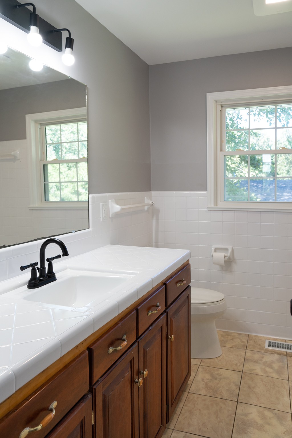 239 Durham Road Leoma, TN 38468 - Photo 5 of 10 a bathroom with a sink a toilet and a window