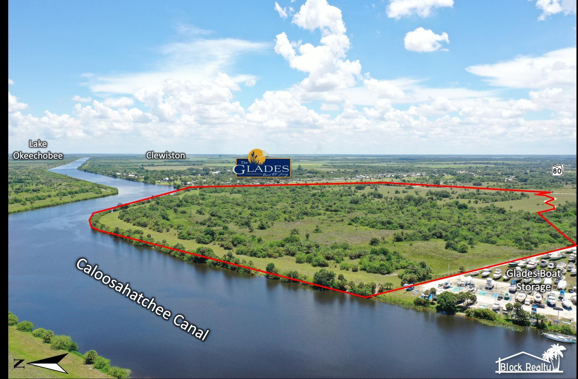 0 Andreachi Road Moore Haven, FL 33471 - Photo 4 of 4 a view of a lake with a garden