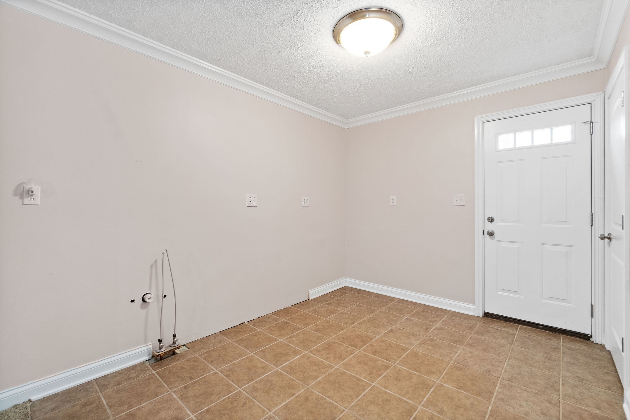 140 Batson Road Cunningham, TN 37052 - Photo 14 of 18 an empty room with a empty space and windows