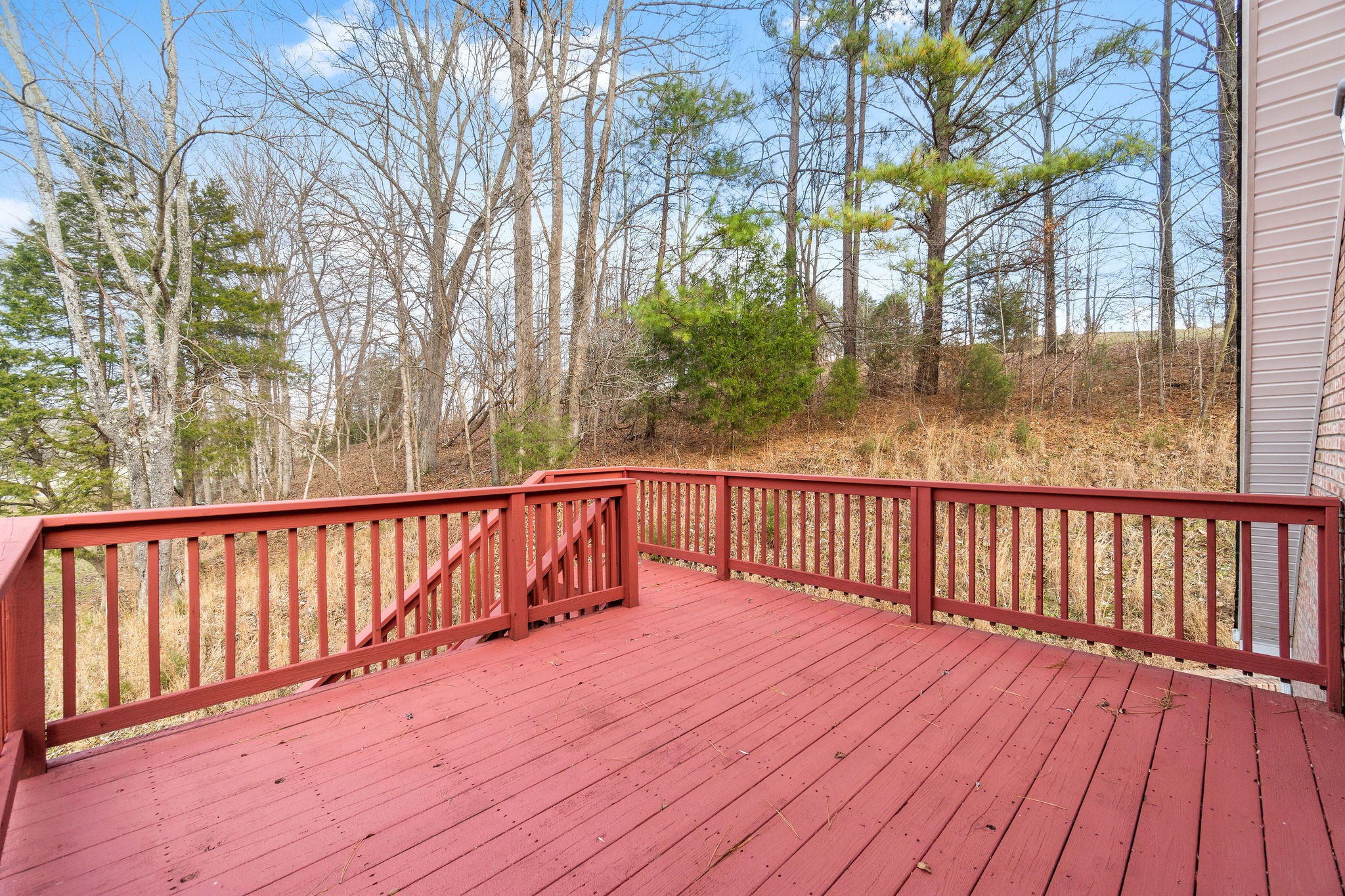140 Batson Road Cunningham, TN 37052 - Photo 16 of 18 a view of wooden balcony with outdoor space