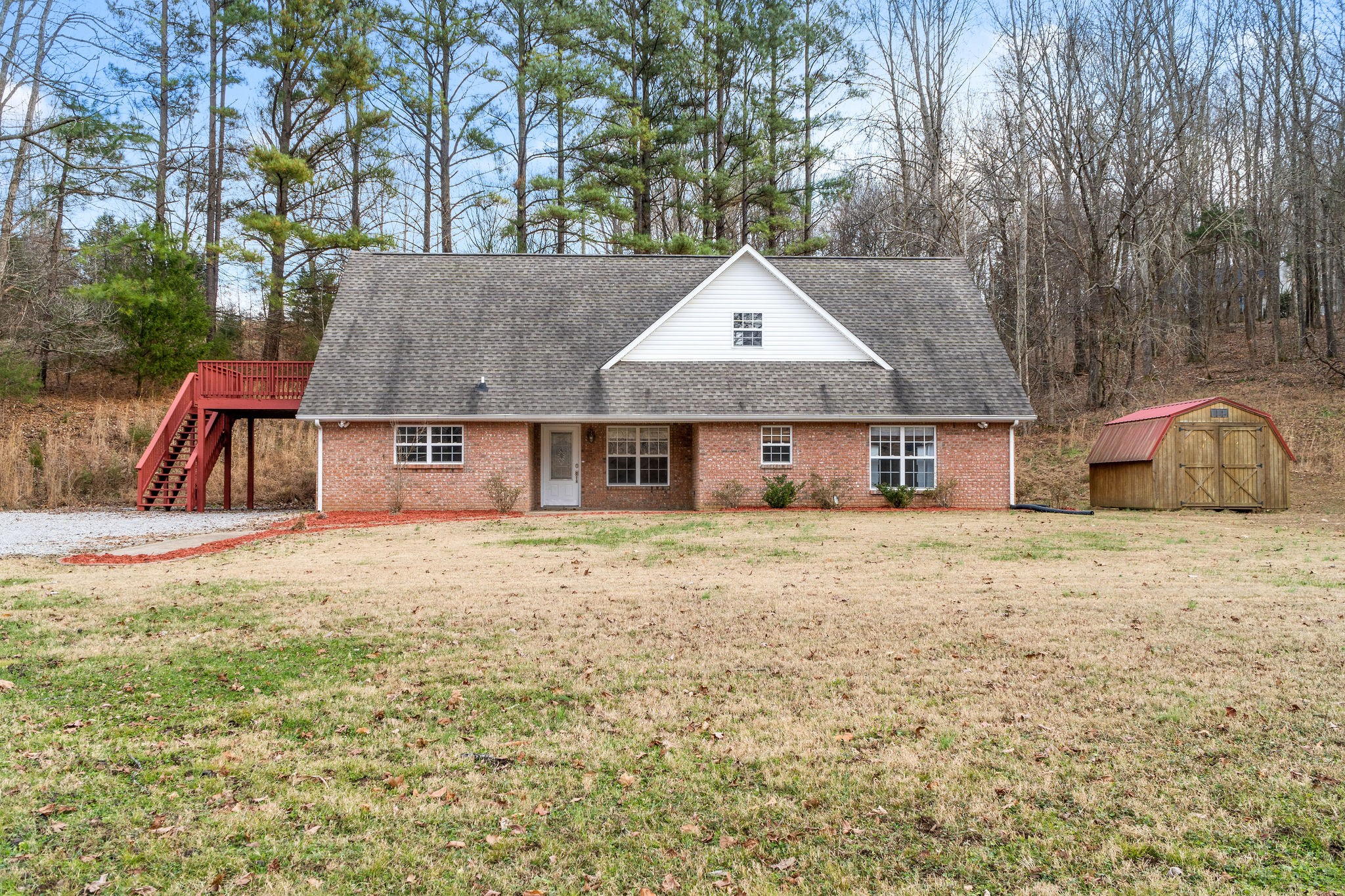 140 Batson Road Cunningham, TN 37052 - Photo 3 of 18 a view of a house with a yard and sitting area