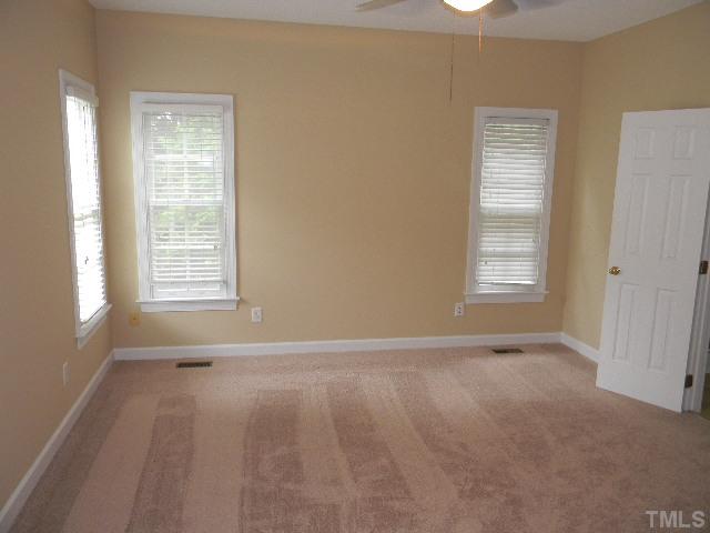 2832 Peebles Road Raleigh, NC 27616 - Photo 7 of 9 a view of an empty room with a window