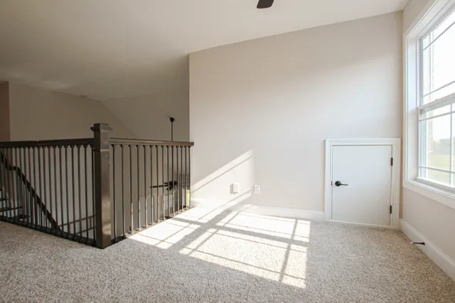 a view of a livingroom with a staircase