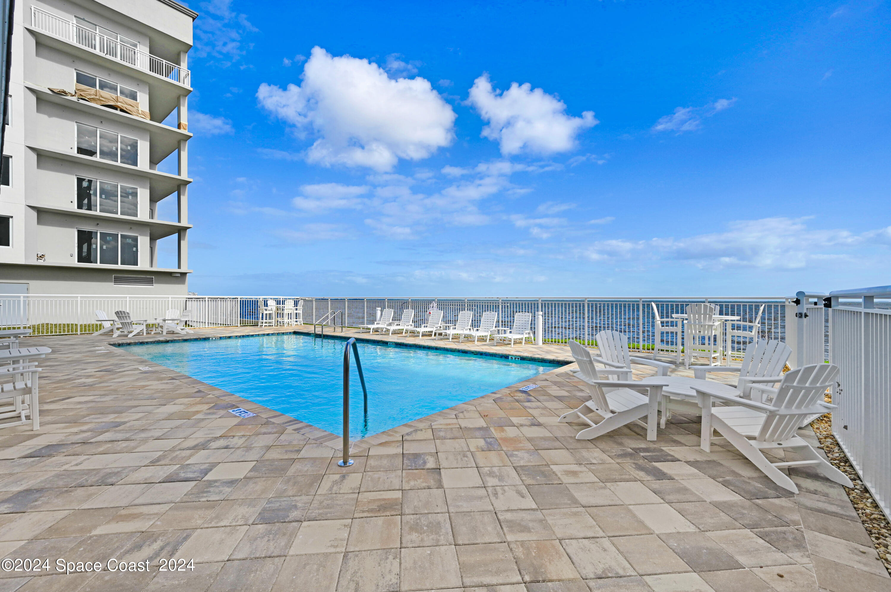 1805 Riverside Drive, Unit 606 Titusville, FL 32780 - Photo 29 of 40 a view of a terrace with chairs