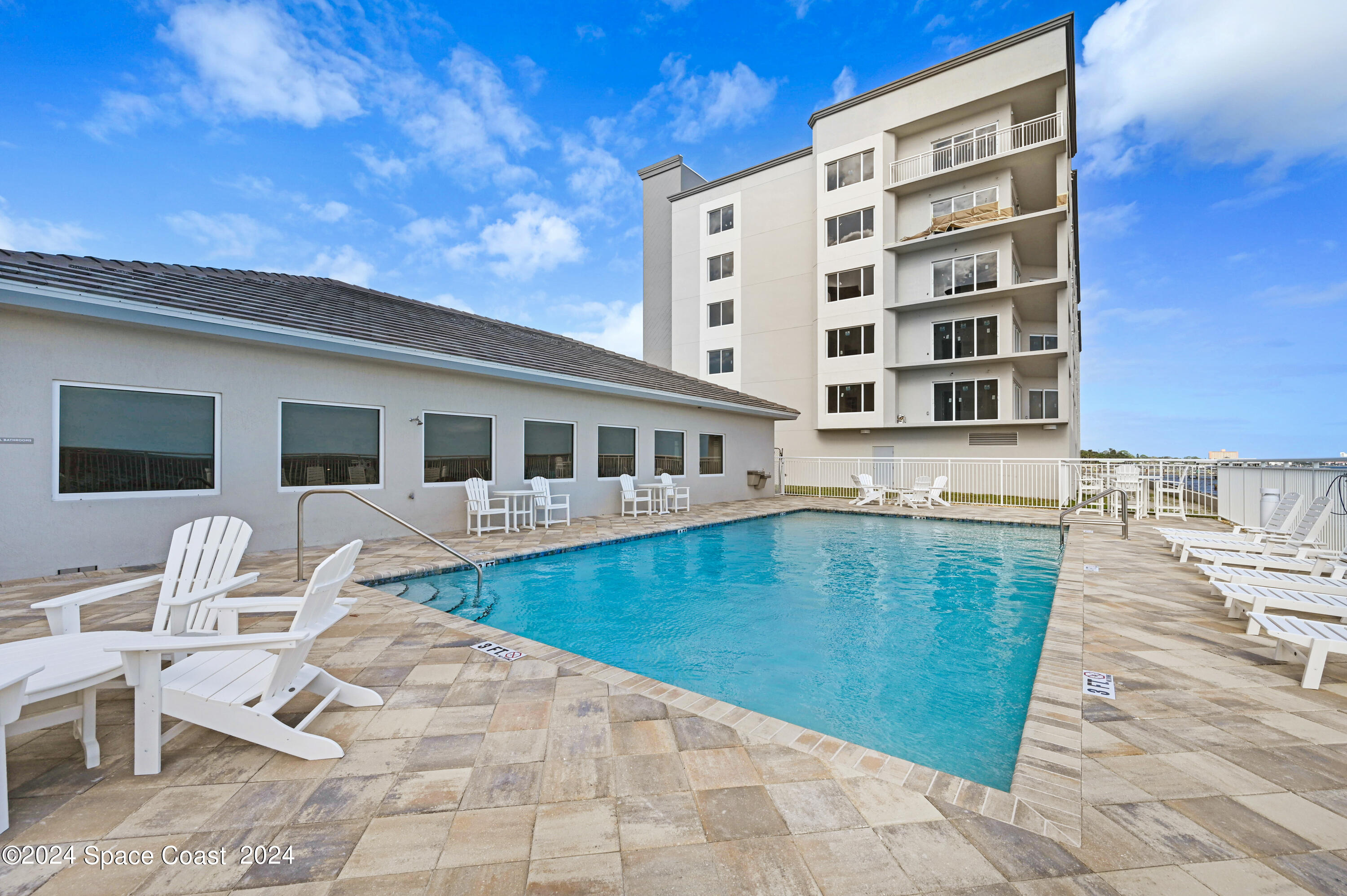 1805 Riverside Drive, Unit 606 Titusville, FL 32780 - Photo 30 of 40 a view of a patio with swimming pool