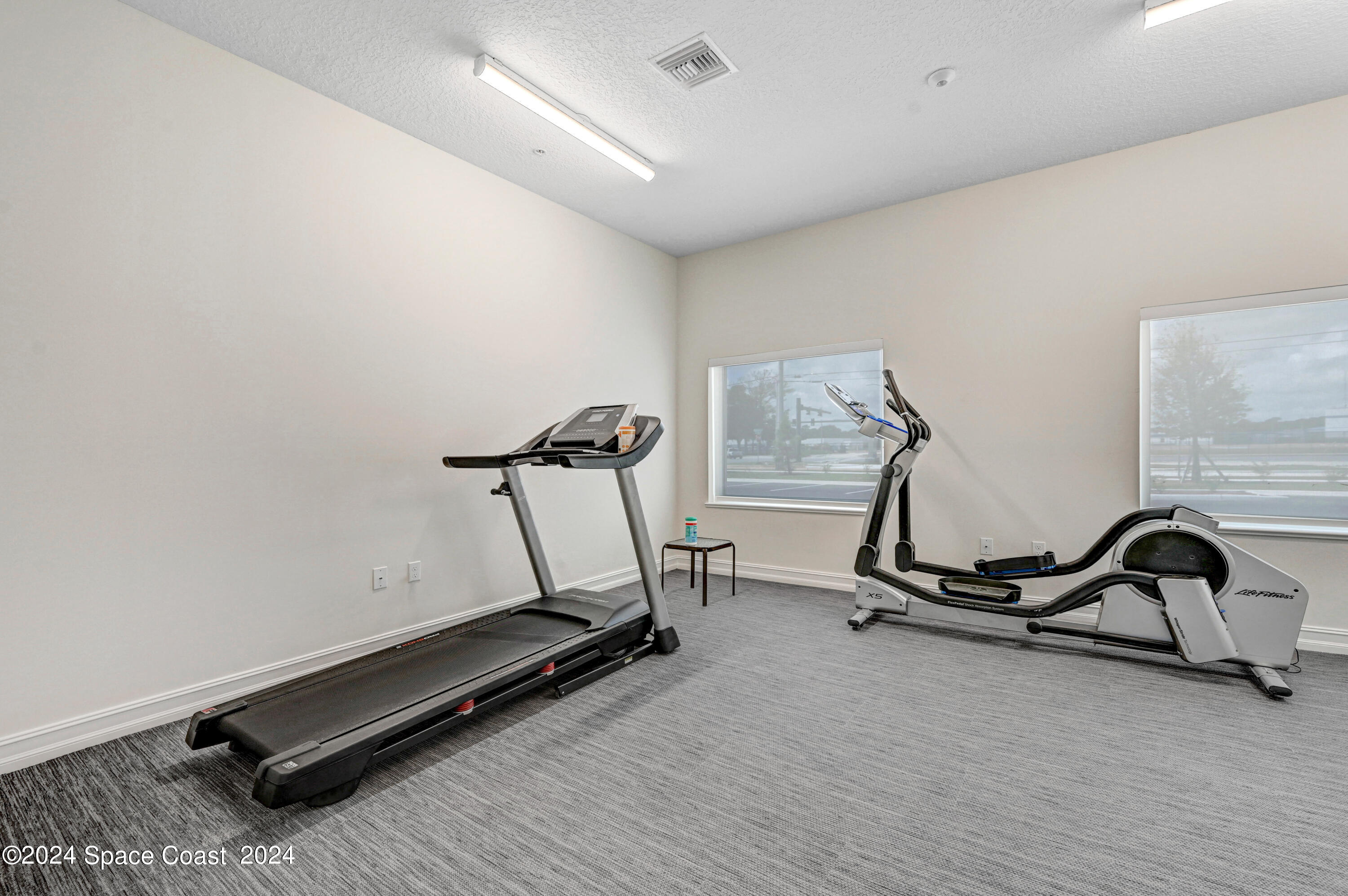 1805 Riverside Drive, Unit 606 Titusville, FL 32780 - Photo 38 of 40 a view of a room with gym equipment