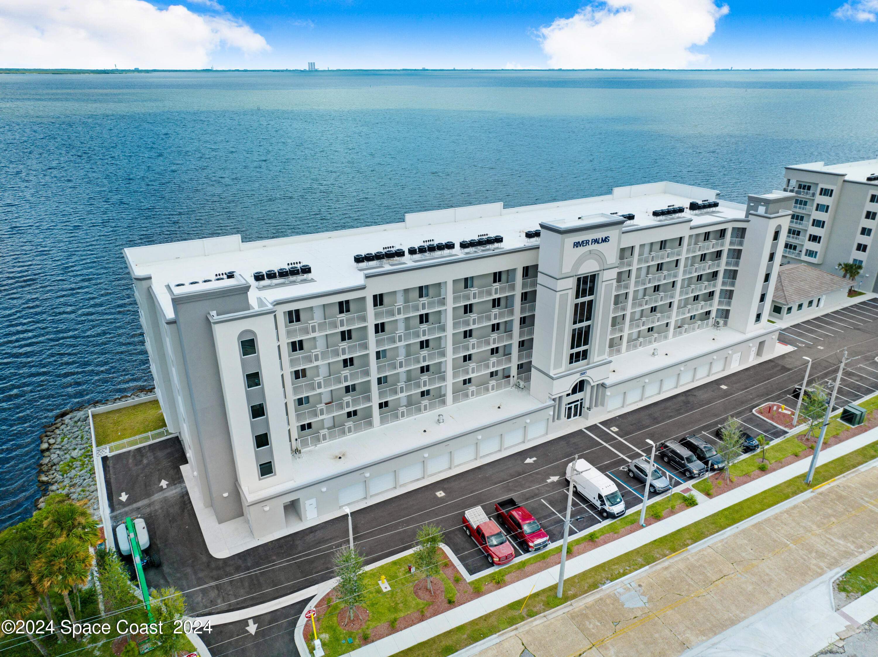 1805 Riverside Drive, Unit 606 Titusville, FL 32780 - Photo 39 of 40 a view of roof with city view