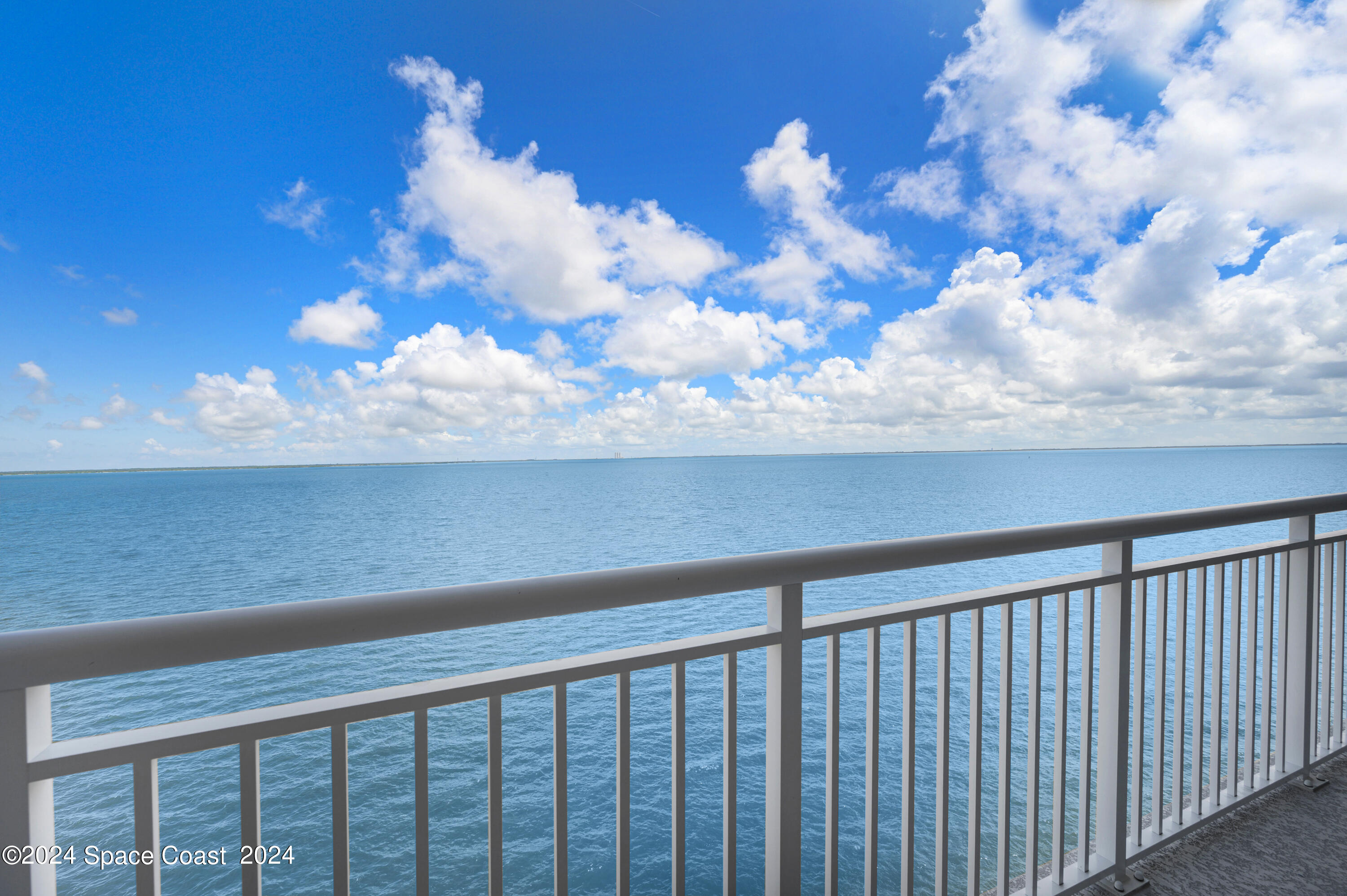 1805 Riverside Drive, Unit 606 Titusville, FL 32780 - Photo 4 of 40 a close view of beach in the back yard