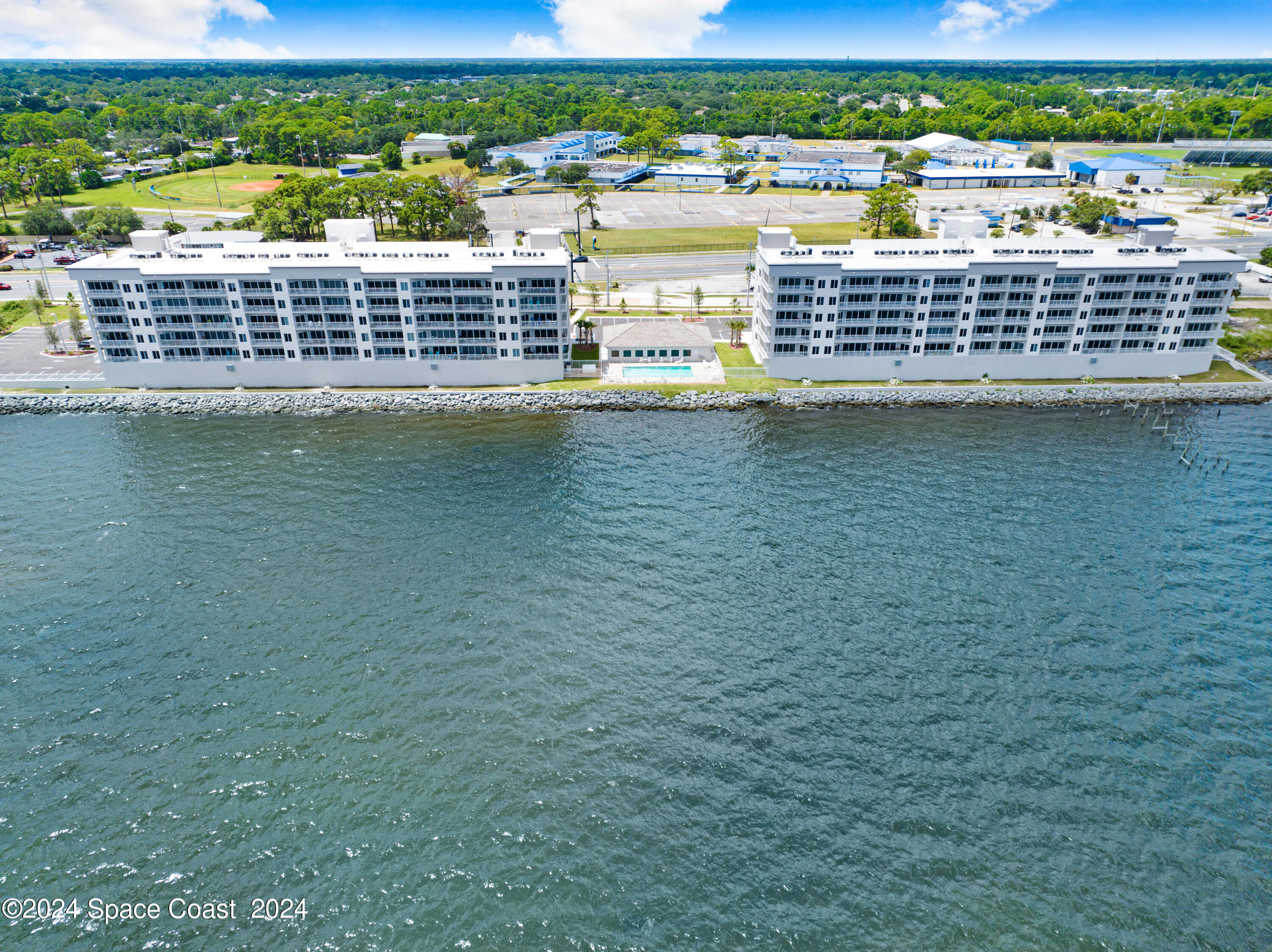 1805 Riverside Drive, Unit 606 Titusville, FL 32780 - Photo 5 of 40 a view of a lake with a city view