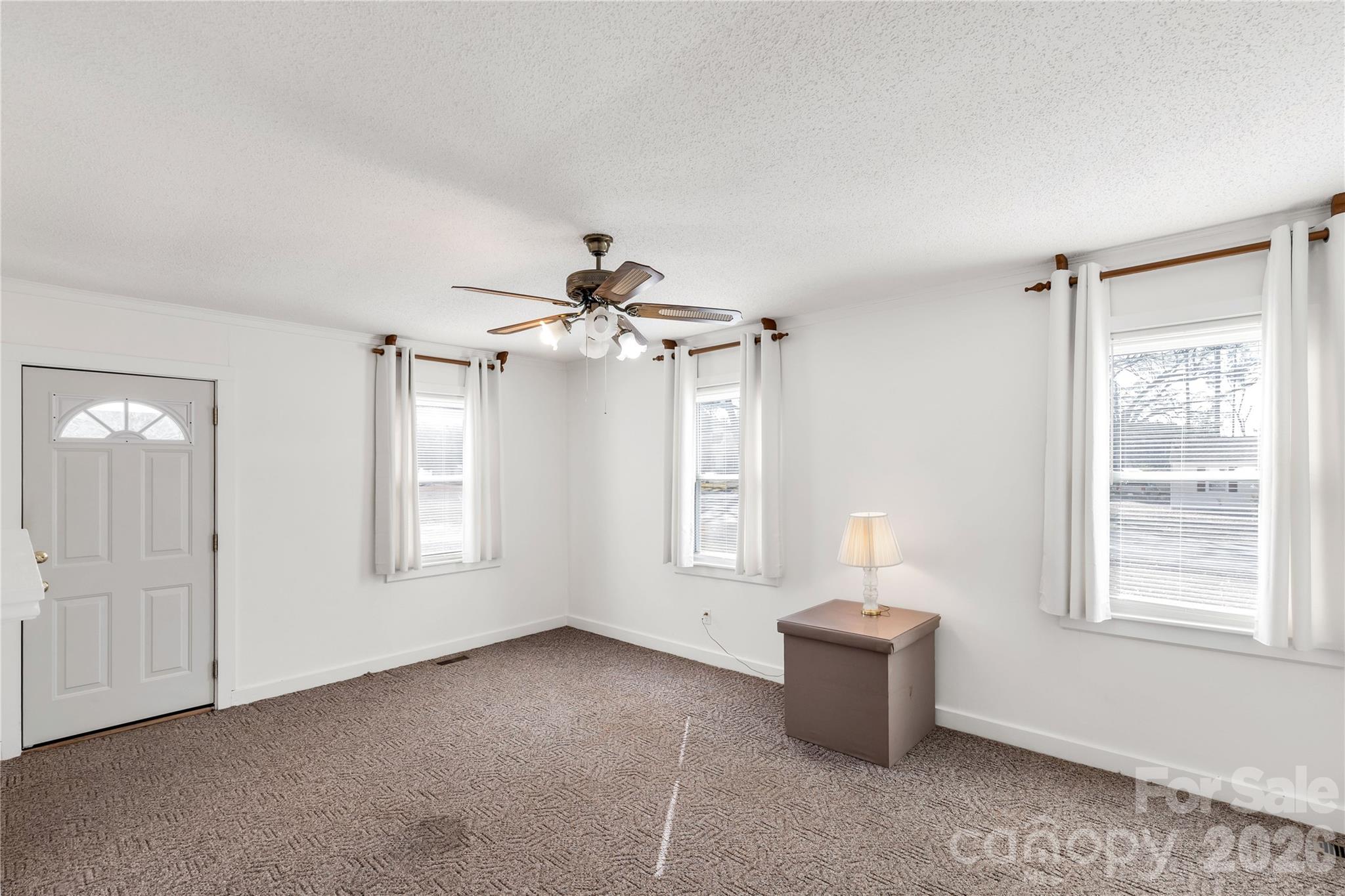 1227 Laurel Avenue Lancaster, SC 29720 - Photo 12 of 48 a living room with furniture and windows