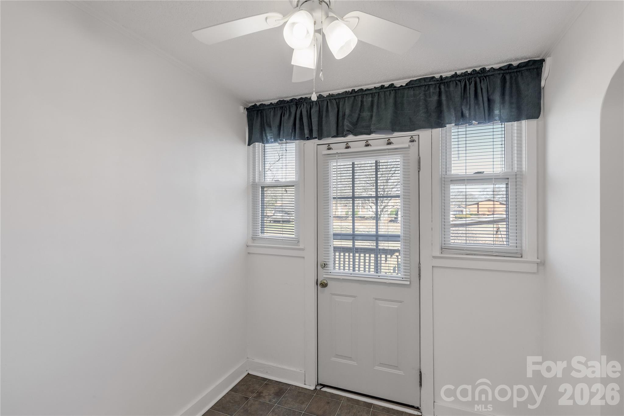 1227 Laurel Avenue Lancaster, SC 29720 - Photo 18 of 48 a view of kitchen with granite countertop cabinets and window