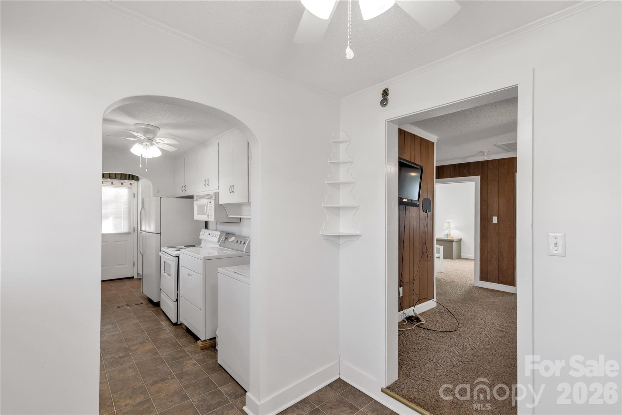 1227 Laurel Avenue Lancaster, SC 29720 - Photo 19 of 48 a view of a kitchen with refrigerator and window