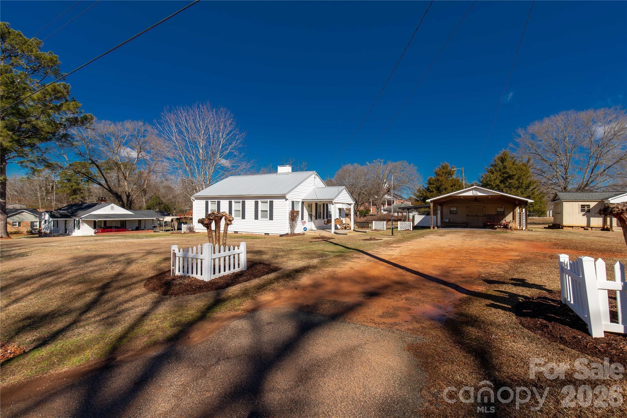 1227 Laurel Avenue Lancaster, SC 29720 - Photo 2 of 48 a view of street with parked cars