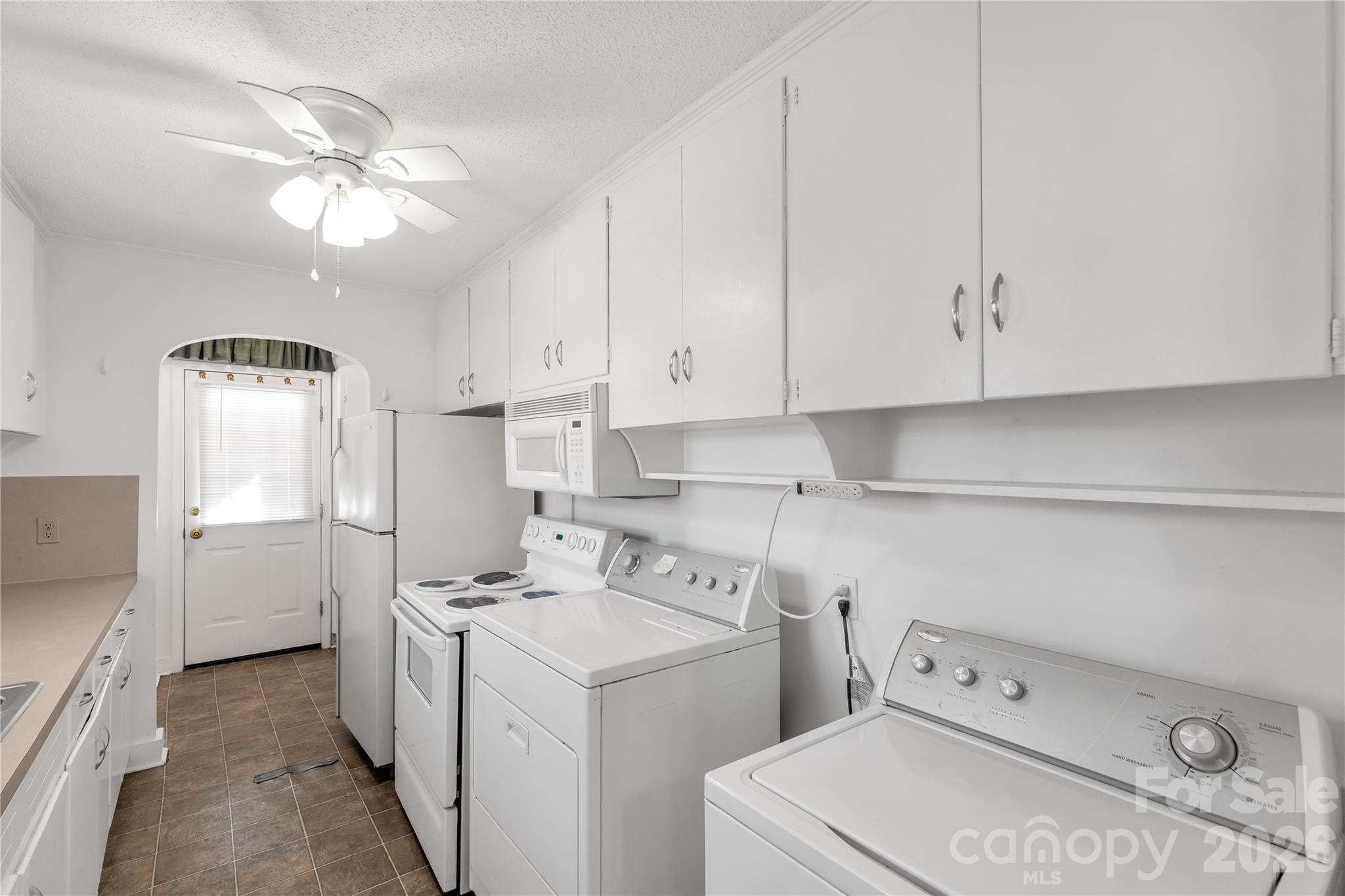 1227 Laurel Avenue Lancaster, SC 29720 - Photo 21 of 48 a view of a storage & utility room with two washing machine