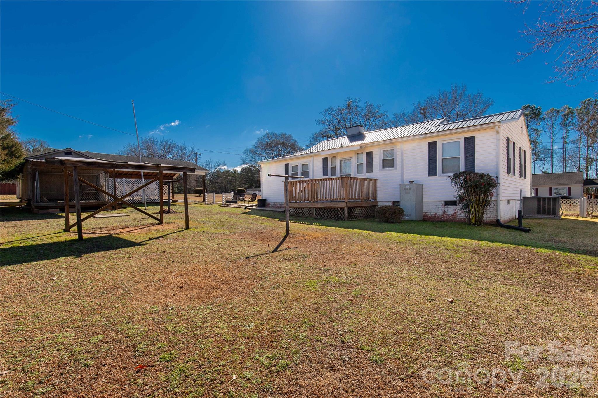 1227 Laurel Avenue Lancaster, SC 29720 - Photo 34 of 48 a view of a house with backyard and sitting area