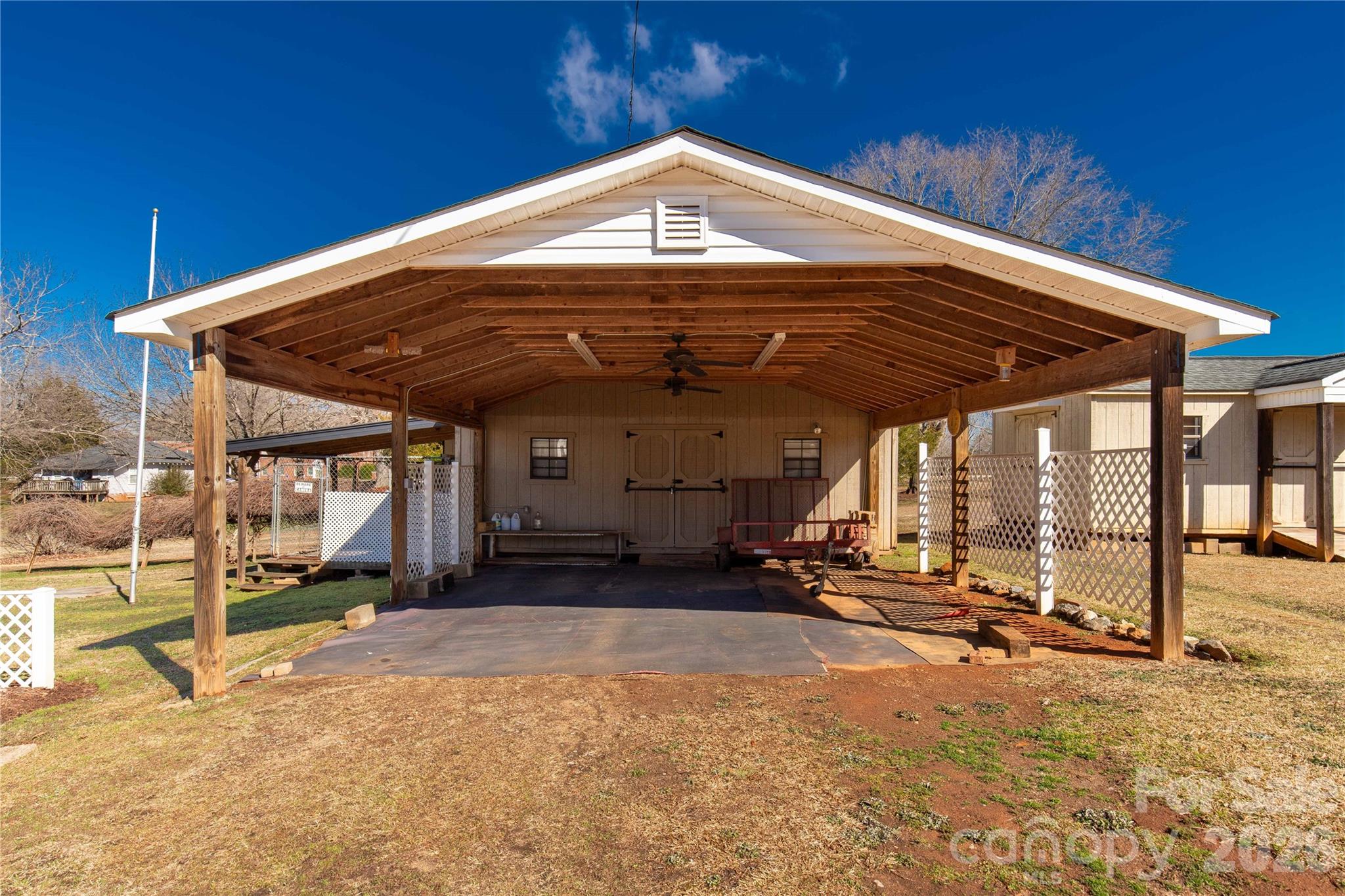 1227 Laurel Avenue Lancaster, SC 29720 - Photo 35 of 48 a view of a chair and tables in the patio