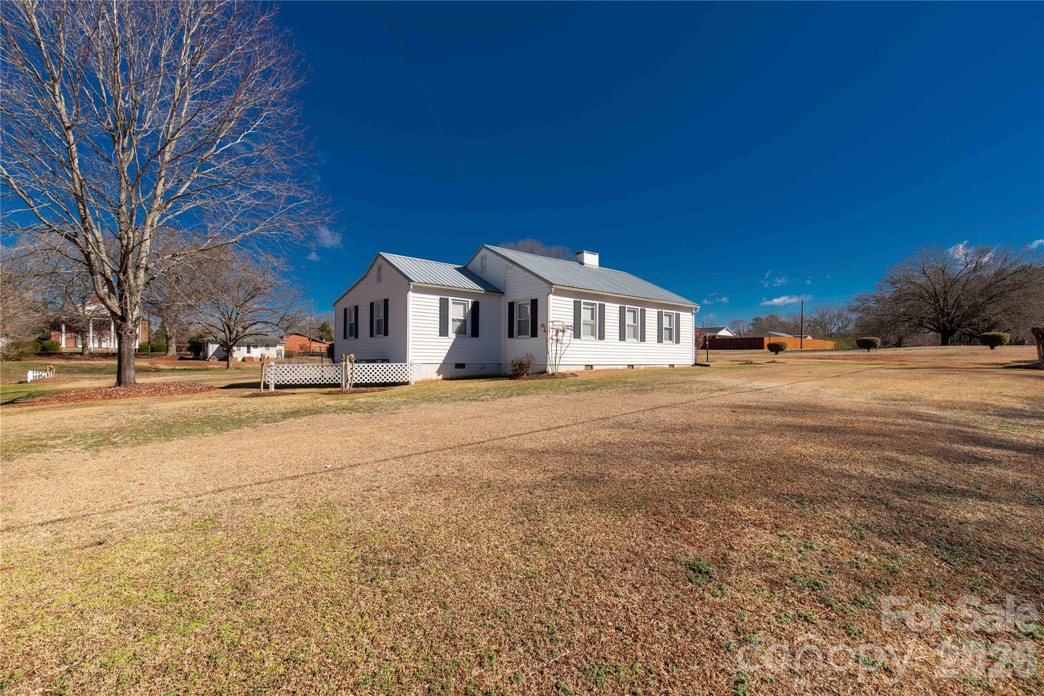 1227 Laurel Avenue Lancaster, SC 29720 - Photo 4 of 48 a view of large house with a yard