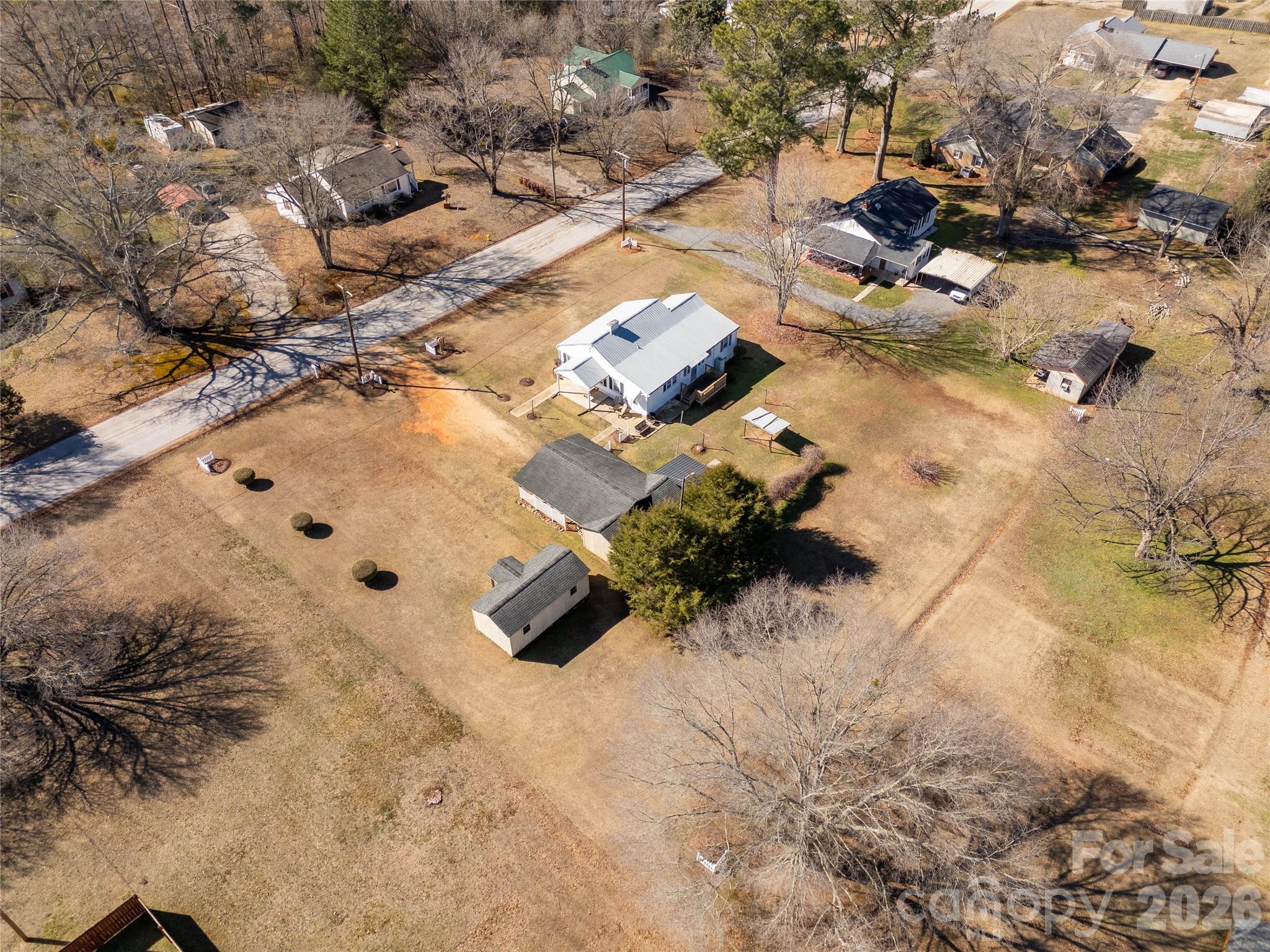 1227 Laurel Avenue Lancaster, SC 29720 - Photo 46 of 48 a view of a yard with snow on the road