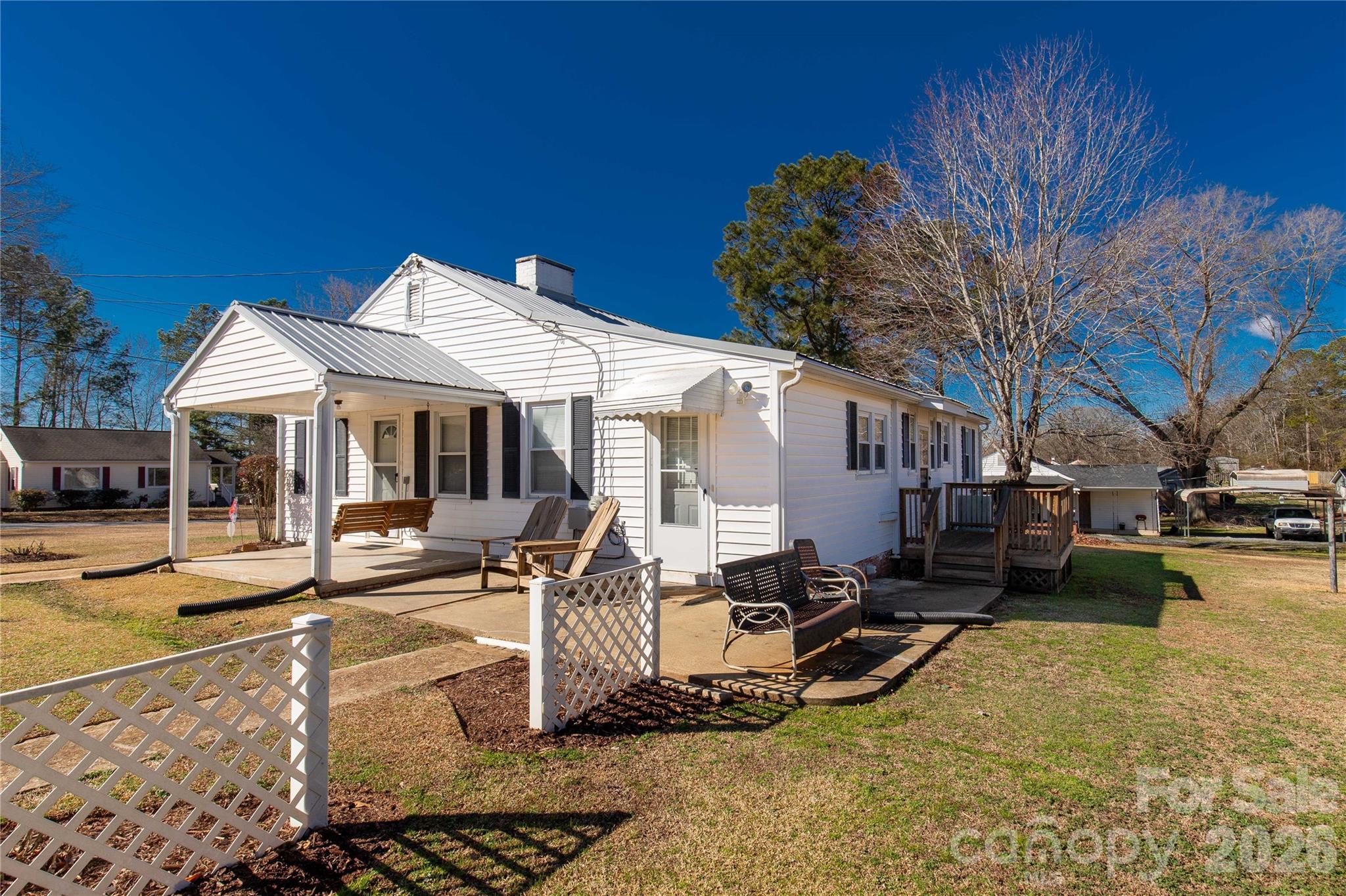 1227 Laurel Avenue Lancaster, SC 29720 - Photo 5 of 48 a view of a house with swimming pool