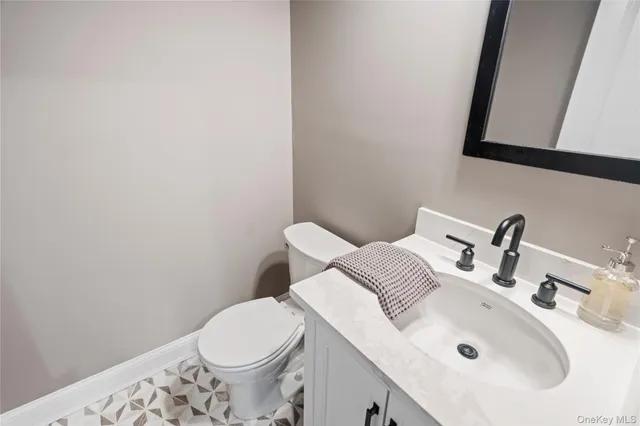 a bathroom with a sink and a toilet