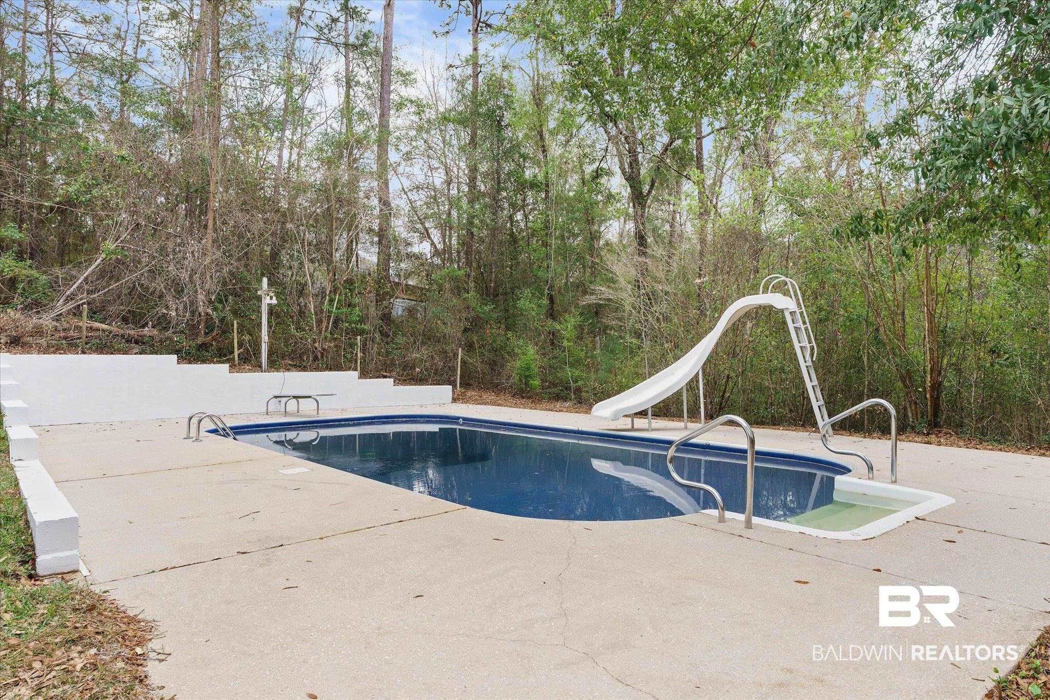 106 Melanie Loop Daphne, AL 36526 - Photo 36 of 45 Outdoor pool with a water slide and a patio area