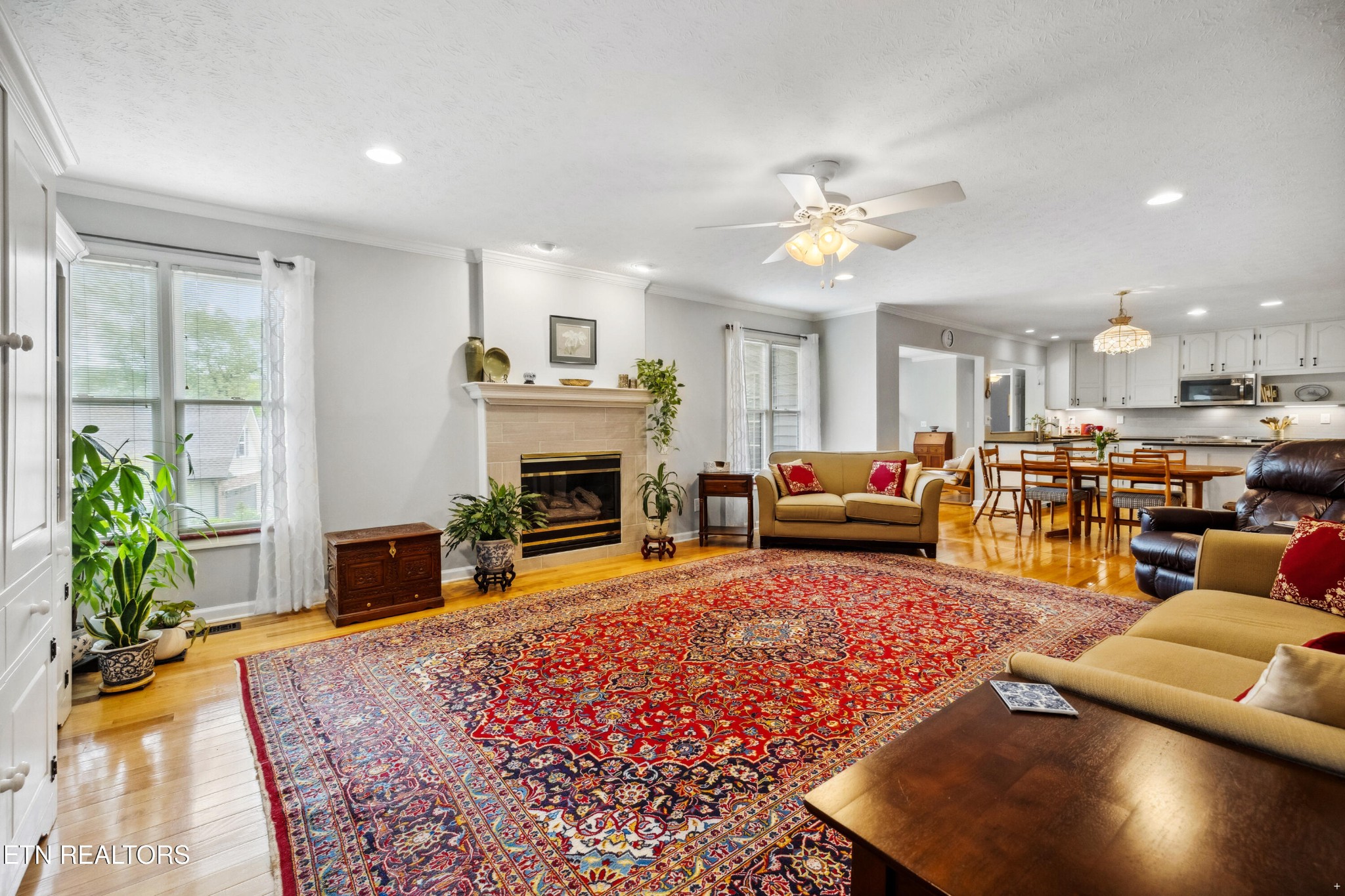 109 West Melbourne Road Oak Ridge, TN 37830 - Photo 8 of 31 a living room with furniture fireplace and a large window