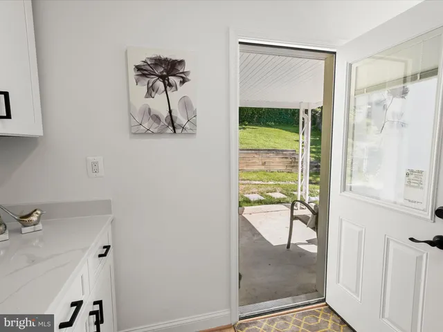 a workspace with furniture and wooden floor