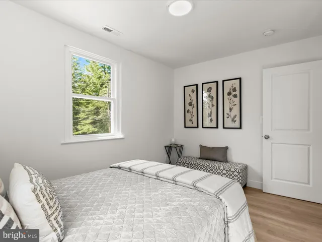 a view of a living room with furniture